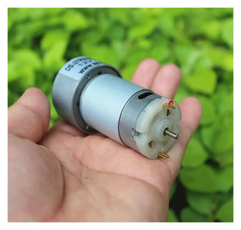 Kickstart Your Build With This Heavy Duty 37 MM Geared Electronic Starter held in hand, showcasing metal gearbox and motor design.