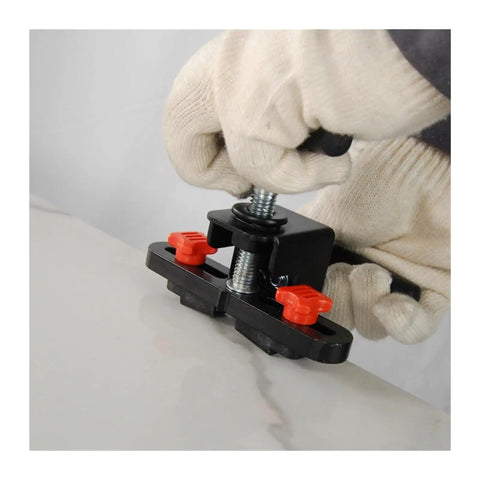 Hands using Heavy Duty 3200Mm Manual Tile Cutter For Large Format Porcelain Stoneware to secure tile for cutting.