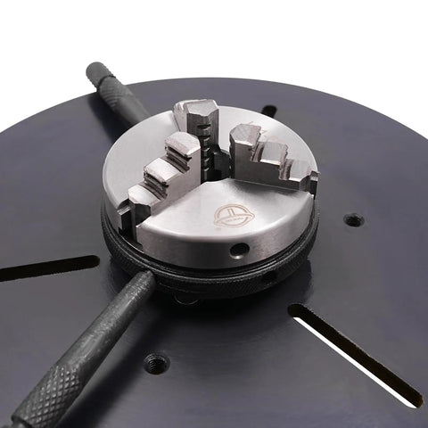 Heavy Duty Rotary Welding Positioner With Three Jaw Chuck, detailed view of the chuck mechanism on steel workbench.