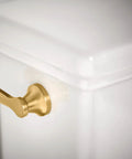 Brushed Gold Toilet Tank Flush Lever 3.31 Inch, Transitional Metal Decorative Handle on white toilet close-up view
