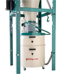 Heavy Duty Three Horsepower Cyclone Dust Collector Workhorse With Fifty Five Gallon Steel Drum and slick polyester cartridge filter.