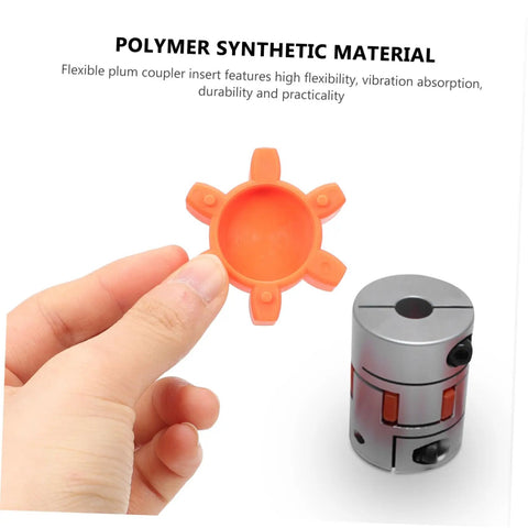 Hand holding Flexible Rubber Spider Insert For Plum Jaw Couplings Elastic Shock Absorption Pad next to coupling kit