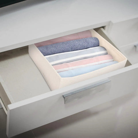Foldable Beige Closet Storage Basket Straighten Your Space Fast Soft Polyester Cotton Linen Drawer Organizer For Socks Undies And Ties in a drawer with rolled clothes.
