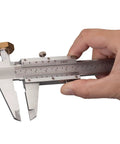 Hand using Vernier Caliper Measuring Tool With 6 Inch Range And 0 To 150 Millimeters Manual Non Digital Calipers High Precision 0.001 Inch 0.02 Millimeters Durable Workhorse For Industrial Workshop Projects