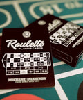 Premium Roulette Casino Playing Cards Crafted For Magicians And Card Sharks Featuring Dope Vintage Graphics on a green felt surface.