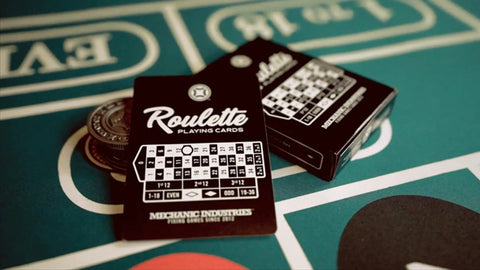 Premium Roulette Casino Playing Cards Crafted For Magicians And Card Sharks Featuring Dope Vintage Graphics on a green felt surface.