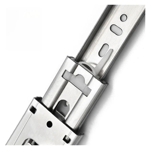 Close-up of stainless steel drawer slides with soft close and full extension 10 to 22 inch track rails for cabinets and furniture.