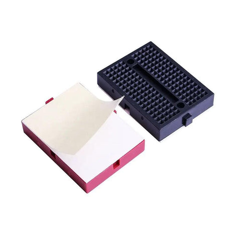 Six Color 170 Tie Point Mini Breadboard Kit with self-adhesive backing, black and red breadboards shown with adhesive backing exposed