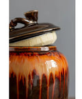 Solid Glazed Ceramic Tea Canister With Airtight Ruyi Lid featuring a unique drip glaze design, ideal for storing coffee or spices.