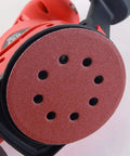 Get Ready To Sand And Polish Like A Pro With This Awesome 10 Pack Of 5 Inch Hook Loop Sanding Discs featuring eight holes for dust extraction on a sander.