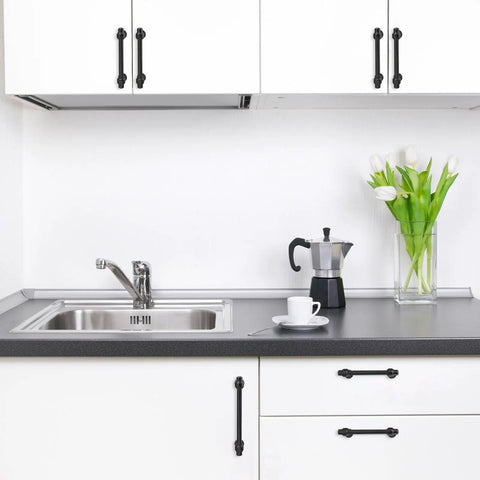 Tough As Nails Matte Black Cabinet Pulls 10 Pack 5 Inch Center To Center Kitchen Drawer Handles in a modern kitchen setting.