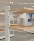 Adjustable Metal Shelf Bracket For Retail Displays And Modular Shelving Fits Standard AA Pillar Slots in a store setting