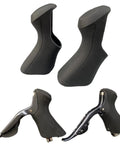 Silicone Brake Lever Hood Covers For Ultegra ST-6870 Road Bike Shifters, showing black pair with textured grip and shifters installed.