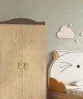 Solid Brass Goldfish Drawer Knobs Set For Cabinets And Dressers on wooden wardrobe in child's room, easy install, durable finish.