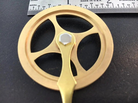Replacement Grandfather Clock Pulley for Cable Movements One And Three Quarters Inch DIY Clock Assembly Kit close-up with ruler