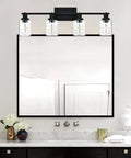4 Light Track Lighting Kit Matte Black With Pivoting Heads over bathroom mirror, clear glass shade, modern decor