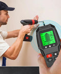 Person using 7 in 1 Smart Stud Finder Wall Scanner with LCD Display while drilling into a wall.