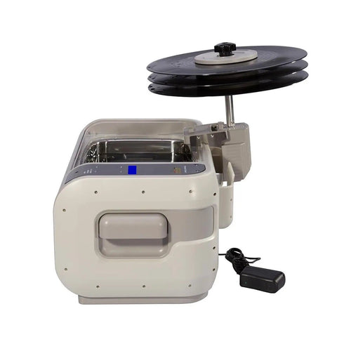 Top Shelf Ultrasonic Vinyl Cleaner Featuring Digital Controls And Stainless Steel Basin, side view with three LPs stacked.