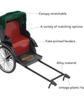 Vintage Red Zinc Alloy Rickshaw Model Toy With Sick Hand Painted Details And A Clean Finish showing a detailed black rickshaw with red seat.