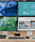 Game Changer Thunderbolt 5 Laptop Docking Station With Dual Hdmi 2.0 Ports And Quad Monitor Setup For Windows Workstations shows four displays with various images and data, keyboard, and external drive.