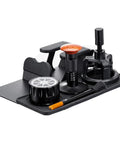 53mm Espresso Tamper Station With Spring Loaded Tamper And WDT Tool For Flawless Pulls on black platform with brush and accessories.