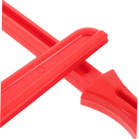 Close-up of red push stick from Four Piece Table Saw Push Stick And Block Set Built For Ergonomic Hand Safety And Precision Cuts With Pro Grade Kickback Control In Carpentry And DIY Projects Great For Home Woodworking And Workshop Use