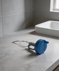Heavy Duty Drain Cleaner Spring Coil Strip Multi Length Plumbing Snaker Flexible Pipe Breaker on bathroom counter.