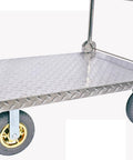 Heavy Duty Steel Platform Truck Cart With Foldable Handle And Silent Swivel Wheels For Smooth Operation Hauling Heavy Loads Daily, featuring a metal deck and gold wheels.
