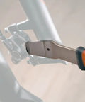 Professional Hydraulic Disc Brake Caliper Piston Press Tool Wrench With Wedge Design And Extra Long Handle in use on bike