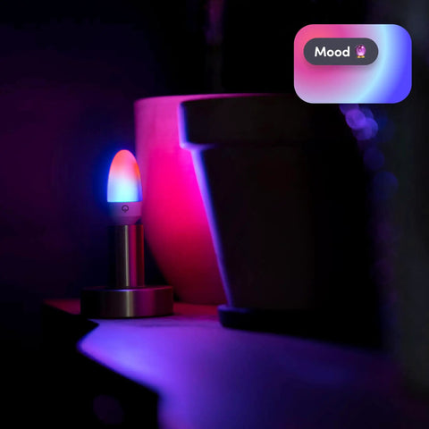 E12 Candle Color Wi Fi Smart LED Light Bulb With Polychrome Technology 27 Addressable Zones Create Smooth Gradients in dark room