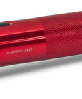 Red flashlight, cylindrical design, branded near the head, reflective finish.