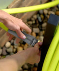 Person connecting Garden Hose Five Eighth Inch By Fifty Foot Lightweight All Weather Water Hose With Ultra Flexible Kink Free Design
