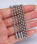 Hand holding 5 Meter Beaded Stainless Steel Roller Blind Chain With 12 Connectors Ball Chain Extender For Roller Blinds And Extensions