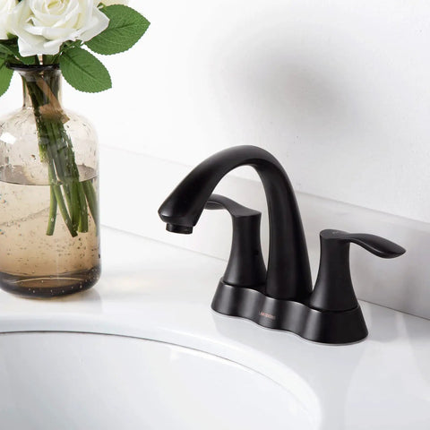Solid Brass 4 Inch Centerset Bathroom Faucet With Two Handles And Drain Assembly Lead Free And ADA Compliant Bronze Gold Finish No Drip
