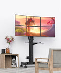 Smooth Ride Six Screen Monitor Rolling Cart With Adjustable Height Stand And Keyboard Tray For Clutter Free Desk Space, featuring multiple screens.
