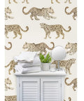 Clean Leopard Print Neutral Vinyl Wall Covering Featuring A Slick Leather Texture And Top Shelf Commercial Durability For Your Next Epic Home Upgrade Now, beige leopard pattern on wall with towels and decor.