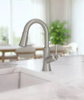hansgrohe Joleena Pull Down Kitchen Faucet, Transitional, Magnetic Hand Sprayer, 1-Handle, 1.75 GPM, Stainless Steel Optic, 04112800 on kitchen sink.