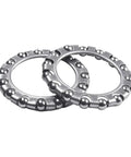 Two visible pieces from a Steering Headset Ball Bearings Set Of 4 For Electric Bikes, Durable Steel Construction, 1.57 Inch Inner By 1.06 Inch Outer Diameter.