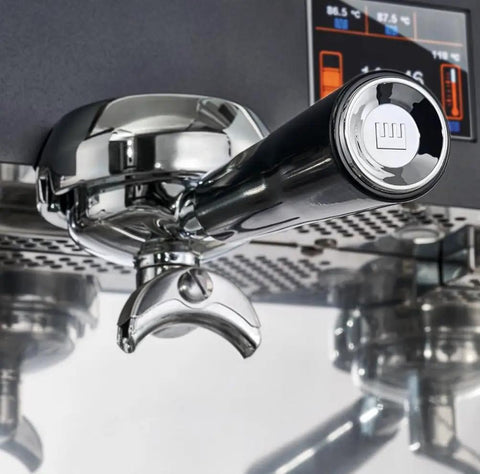 Close-up of portafilter and control panel on Desiderio DESI2V Black 2-Group Espresso Machine With Pro Grade Electronic Control Panel