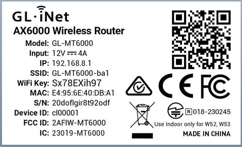 Label of AX6000 WiFi 6 Gaming Router with Ultra Low Latency and Strong Range, showing model, input, FCC ID, and QR code.