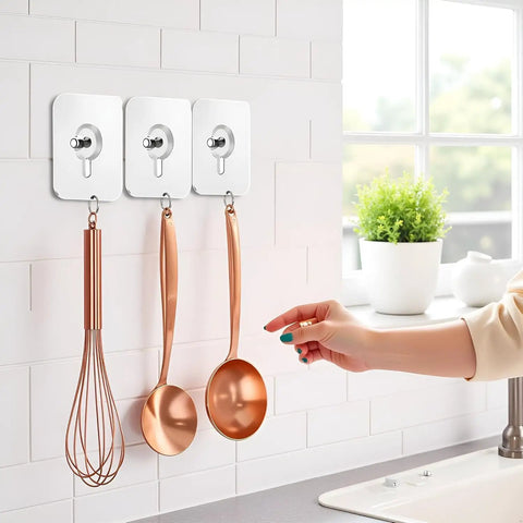 No Drill Wall Hooks Heavy Duty Adhesive Hangers For Kitchen, Bathroom And Home, Damage Free Picture Hanging, 10 Pack With Removable Non Marking Tape, Strong Grip For Towels, Coats, Bags And More. Adhesive wall hooks holding kitchen utensils on tiled wall.