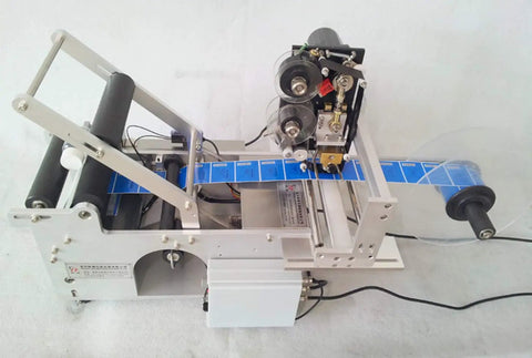 High Speed Round Bottle Labeling Machine Plus Slick Date Printer and Rock Solid Applicator for 150 mm wide containers.
