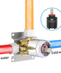 Metal valve installation for High Pressure Shower System With Handheld And Rain Showerhead, showing hot and cold water connections
