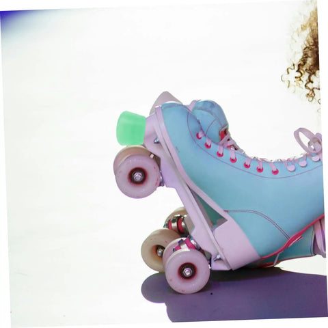 Light green PU brake pad on quad skate, highlighting Toe Stop Replacement Pair For Quad Skates With PU Brake Pads No Fuss Install.