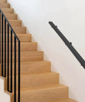 Heavy Duty Stainless Steel Wall Mount Handrail With Sick Grip For Stairs And Bathroom Walls, mounted on a staircase wall.