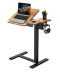 Yihayo Electric Height Adjustable Overbed Table W/ Wheels, 24x16 Inch mobile nursing stand desk with laptop, cup holder, rustic brown top.