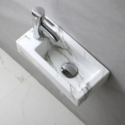 Compact White Ceramic Wall Mounted Sink For Small Bathrooms with chrome faucet, rectangular design, and marble pattern, overhead view