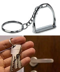 Elegant Stirrups and Snaffle Bit Key Rings D Shaped Keychain made from sturdy alloy showing in hand by a door lock