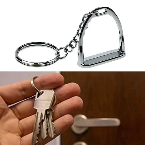 Elegant Stirrups and Snaffle Bit Key Rings D Shaped Keychain made from sturdy alloy showing in hand by a door lock
