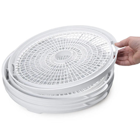 Stackable trays of Electric Food Dehydrator With Four Stackable Trays And Top Mounted Fan for healthy snacking.